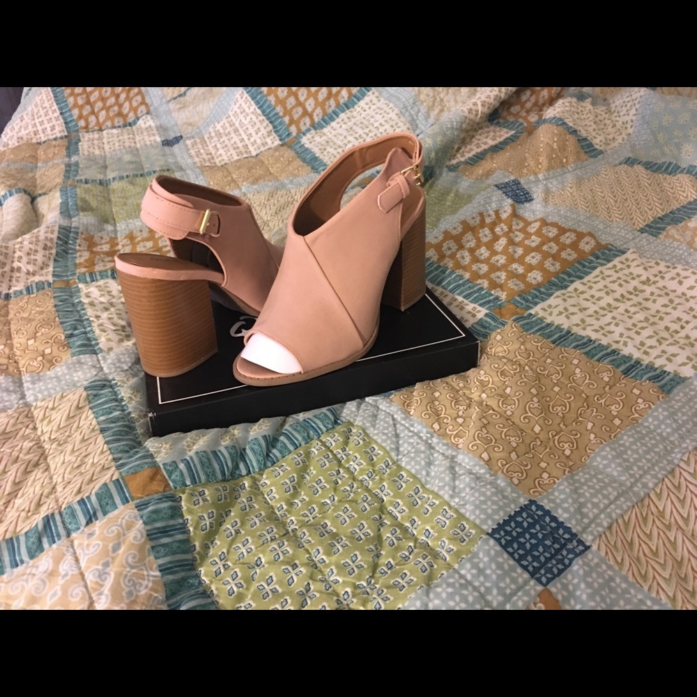 Blush vegan leather open toe booties.